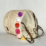 Bolso paja maiz con borlas