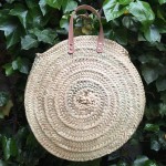 Bolso palma redondo asas de cuero