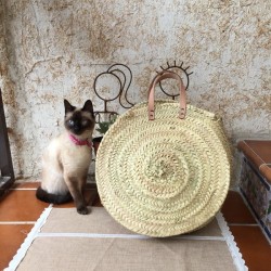 Bolso palma redondo asas de cuero