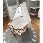 Cuna de juguete vestida