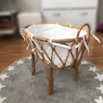 Cuna de juguete vestida