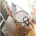 Cuna de juguete vestida