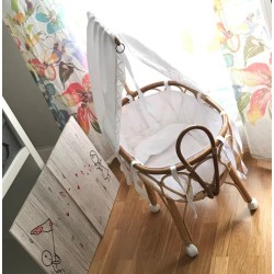 Cuna de juguete vestida